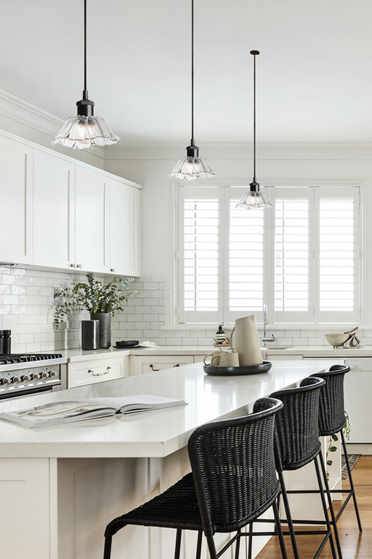 glass pendants in the kitchen over island bench