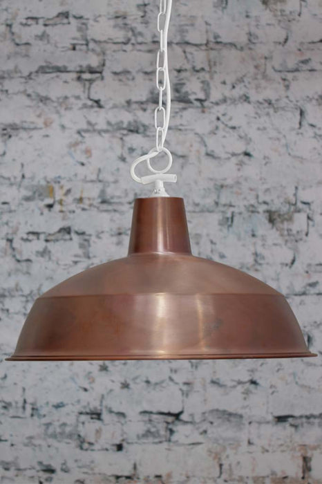 Large solid copper Industrial Warehouse shade with a white side entry chain suspension. 