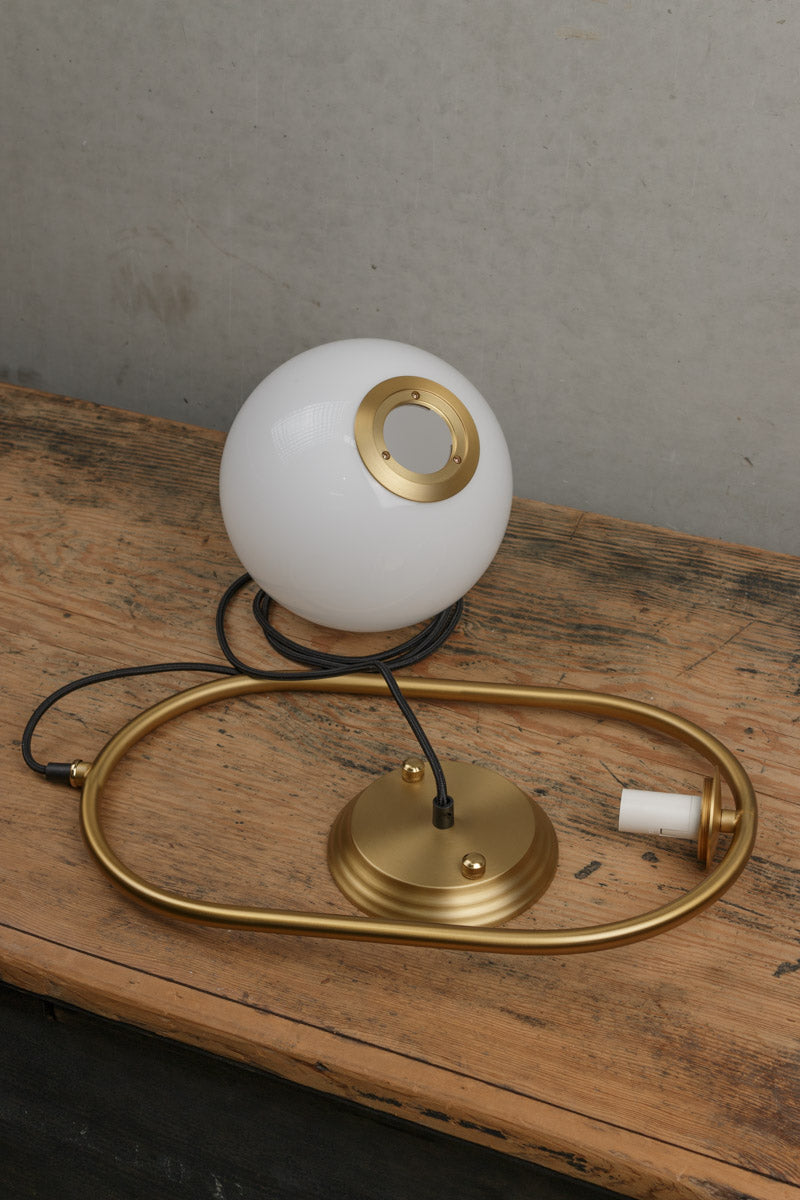 Opal glass pendant light in gold/brass