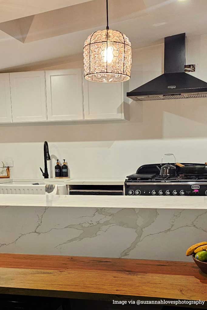 1 tallows pendant light with honeycomb tessallated design glass wire over kitchen island