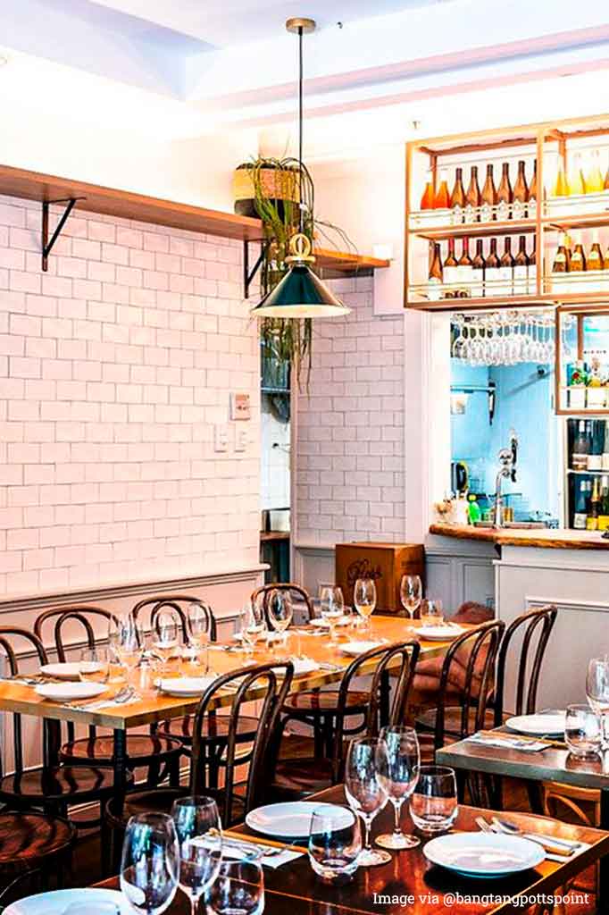 Black cone pendant light in a restaurant