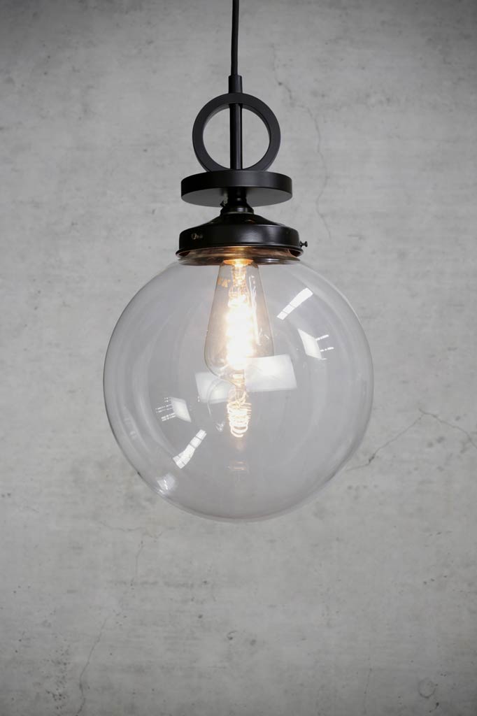 Medium clear pendant with black disc cord