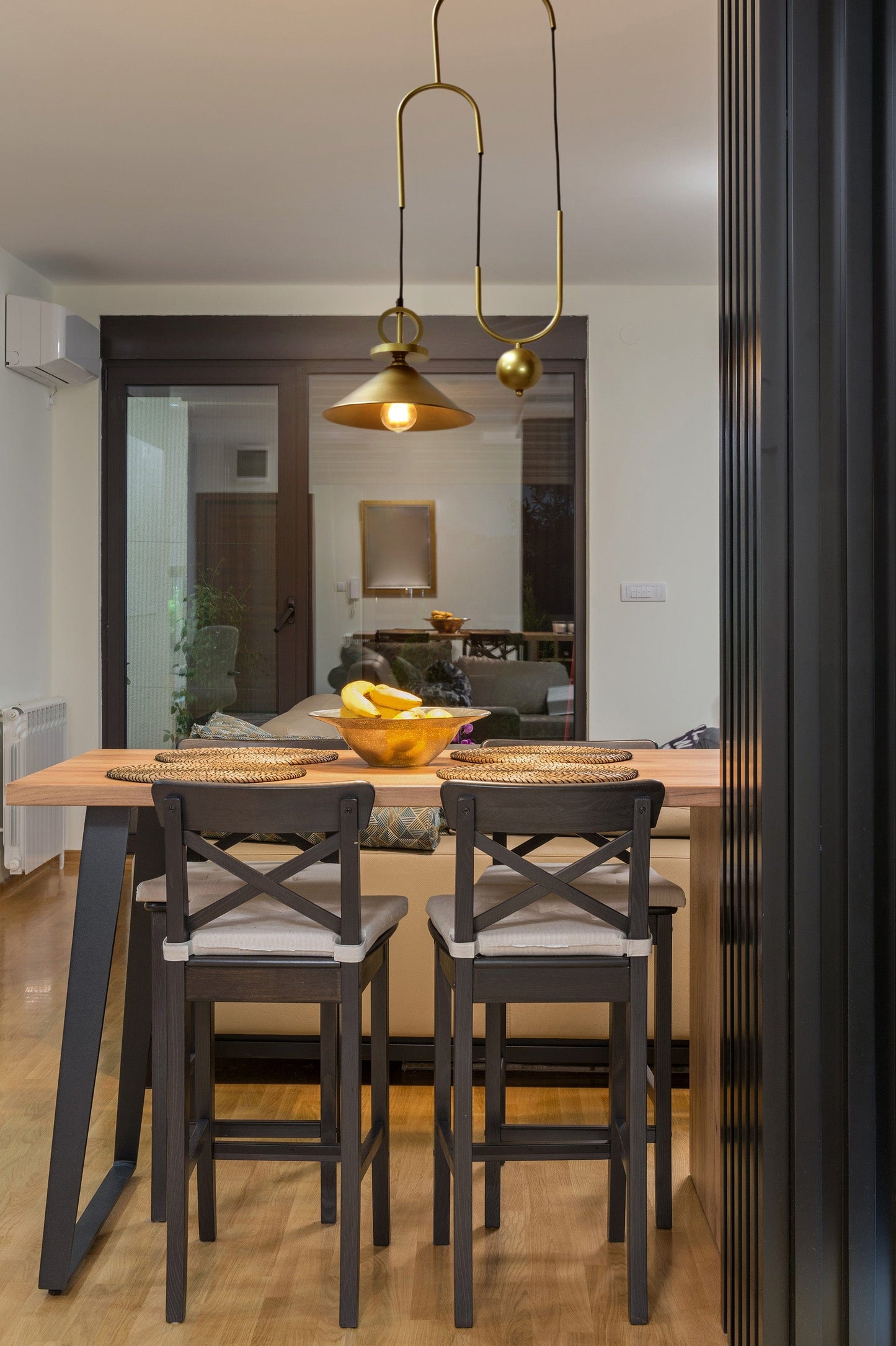 brass pendant over kitchen table