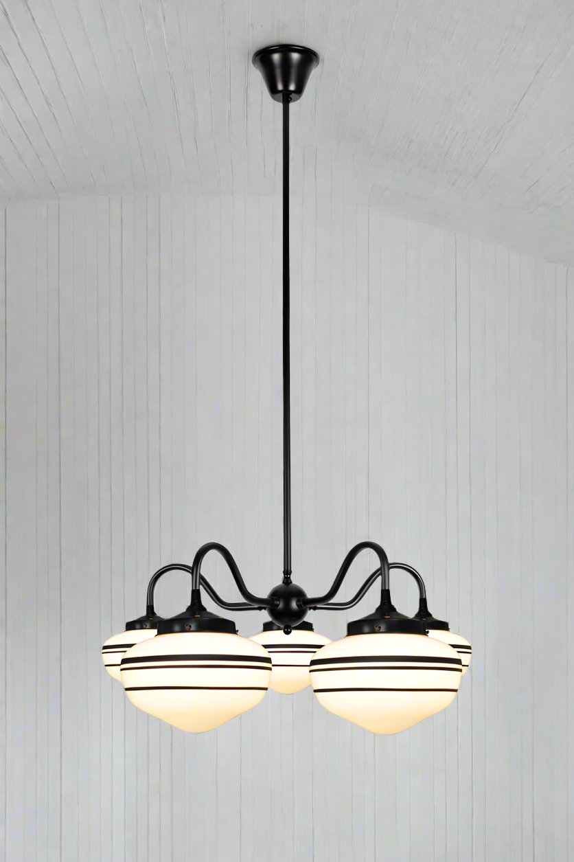 Black 5 arm gooseneck chandelier with 3 stripe small opal washington shades. 