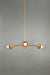 Small Clear glass ball shades on the triple gold/brass chandelier. 