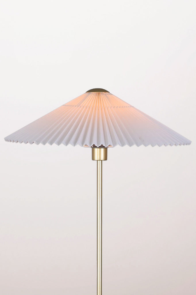 pleat white shade on floor lamp and minimalist metal stand.