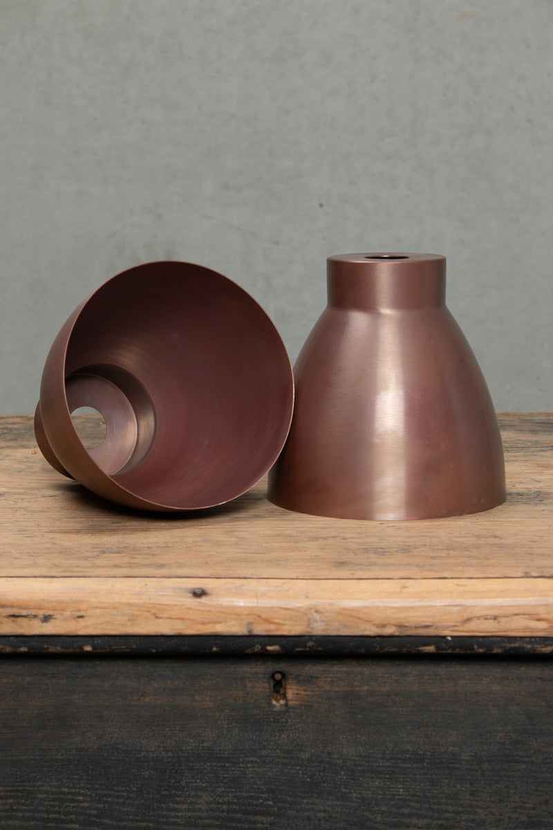 Solid Aged Copper Celler lights showing outer and inner. 