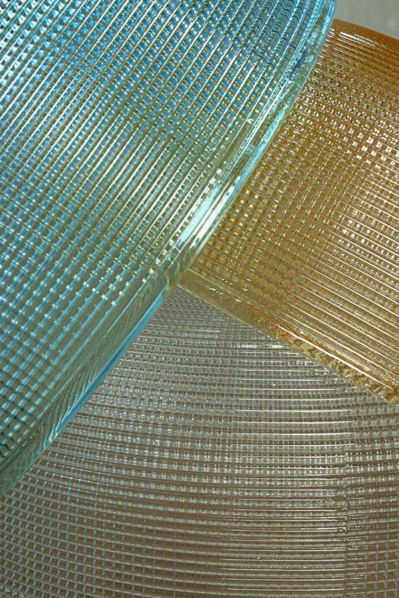 Close up of small S184 glass shades in blue, clear and amber