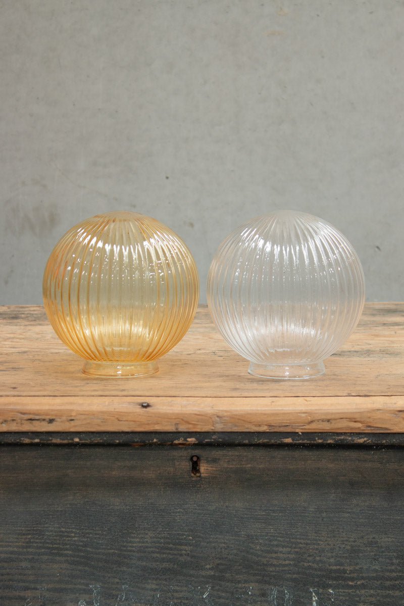 Glass reeded ball shades in Amber and Clear