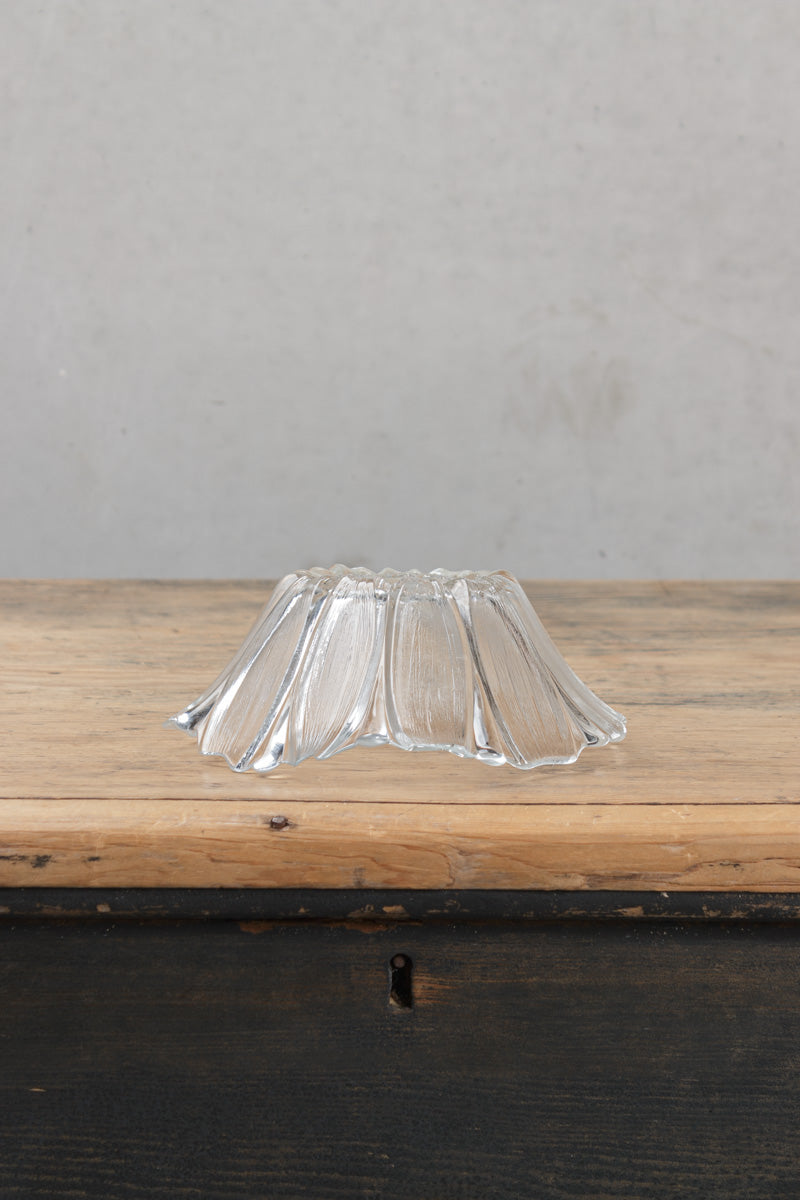 Clear floral inspired glass shade. 