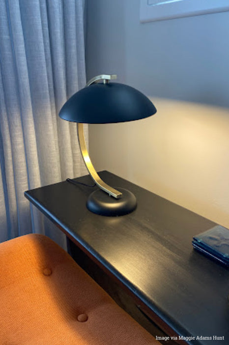 Customer image via Adam Hunt, Black and antique brass curved table lamp