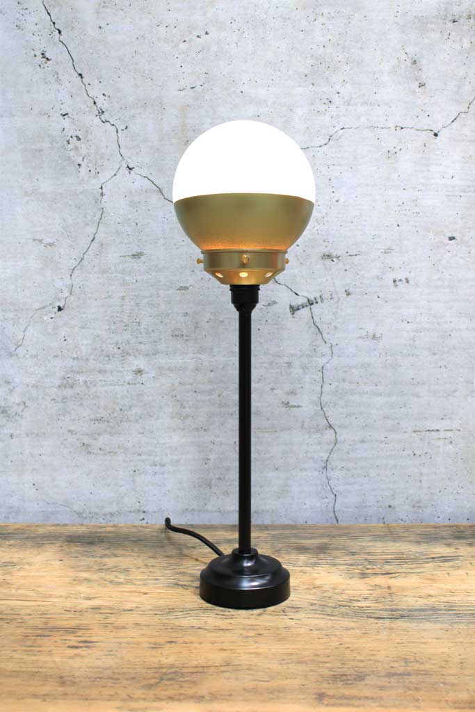 Crown Sphere Table Lamp with a black lamp holder, gold gallery with a gold and opal shade