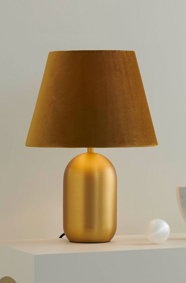 satin brass cylindrical base and gold velbet shade