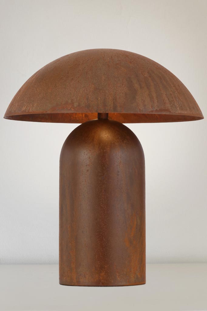 Small Newman Table Lamp in rust.