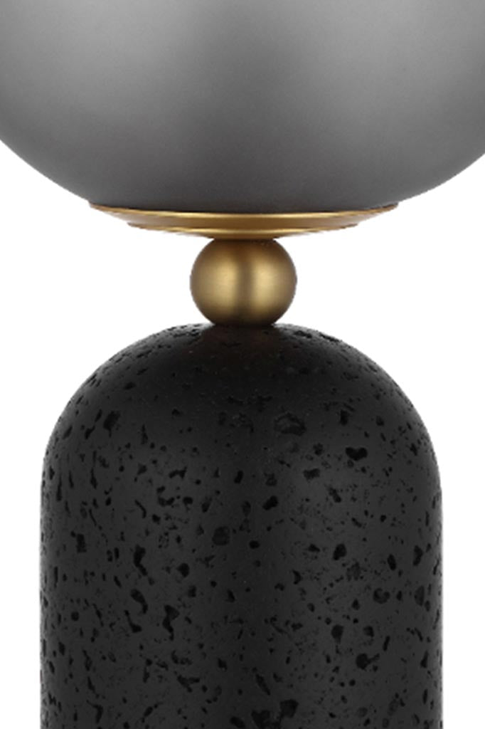 Close up of the Shorestone Glass Ball Table Lamp in black.