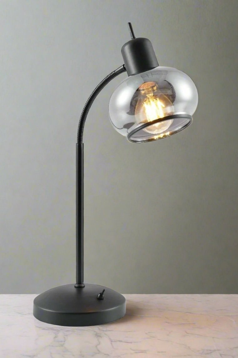 Manhattan table lamp in black on a marble bench