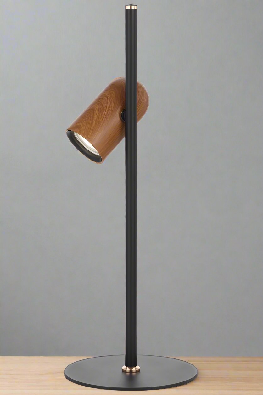 Back of a black table lamp stand with a wood look shade on the side 