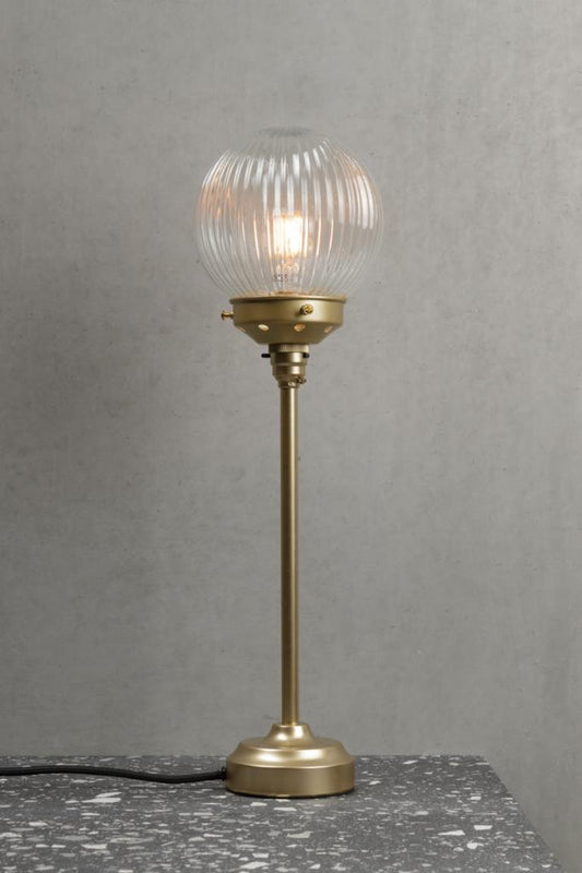 Gold/Brass candlesick lamp stand with a clear reeded glass ball shade. 