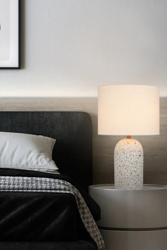 Terrazzo lamp with ivory linen shade used as a bedside lamp