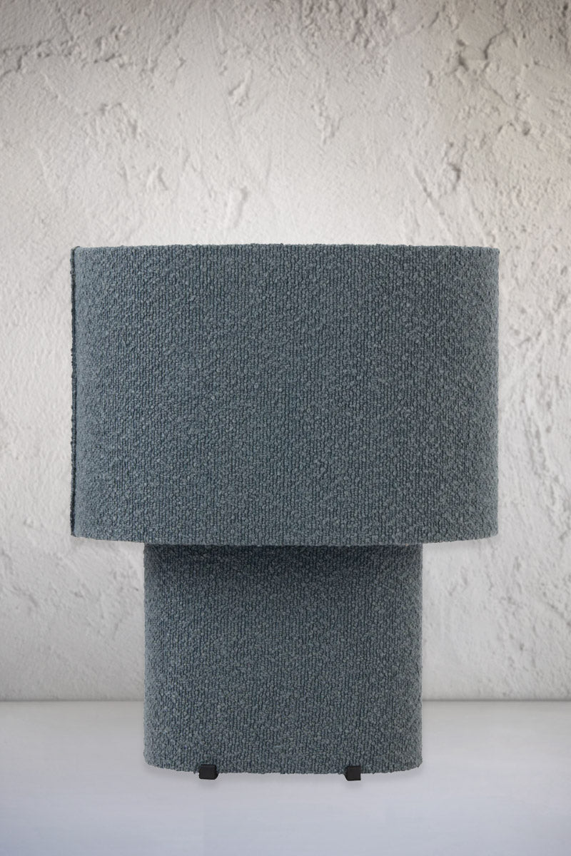 Blue broulee fabric table lamp. 