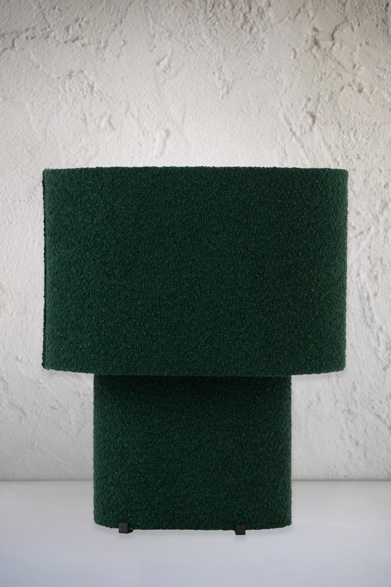 Dark green broulee fabric table lamp. 