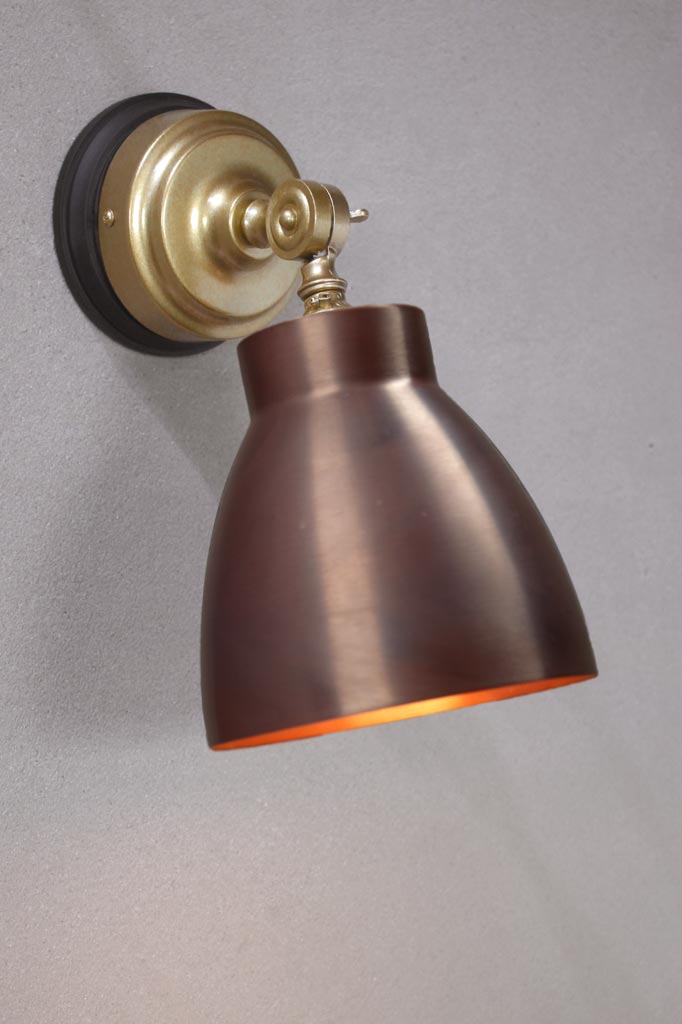 Cellar Batten Light with a solid aged copper shade and a Gold/brass batten holder.