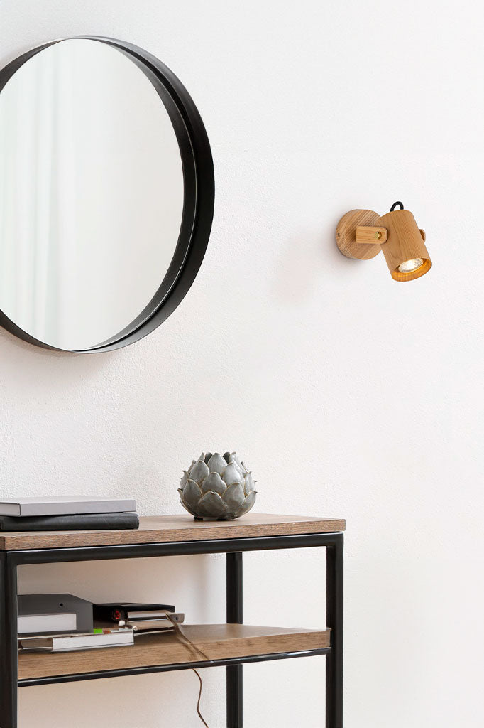 Wood Cylindrical Wall Lamp beside mirror in entrance hallway.