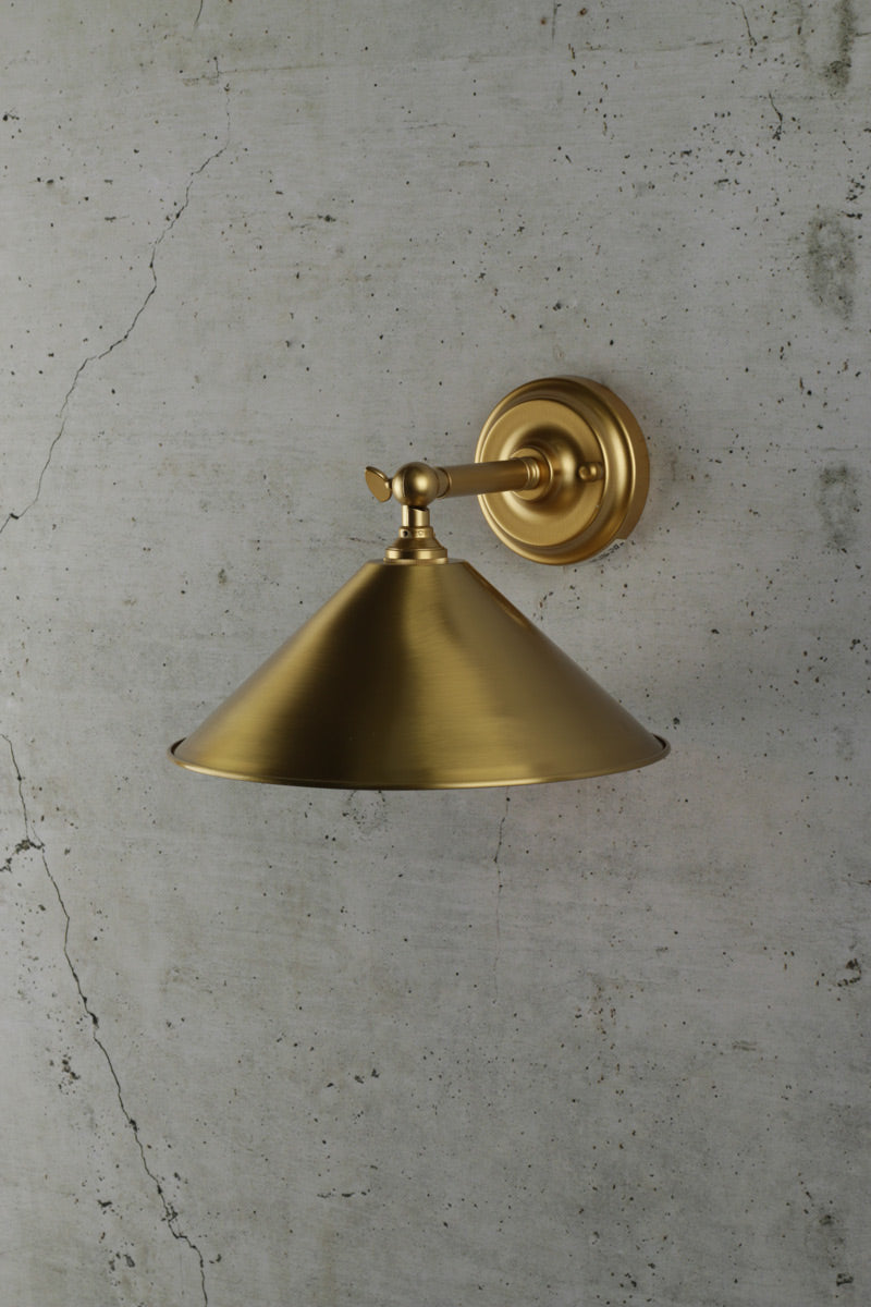 Small brass cone wall light with brass arm