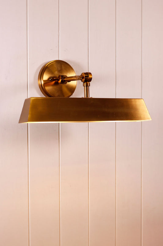 Wall Light casting a warm glow, perfect for pictures