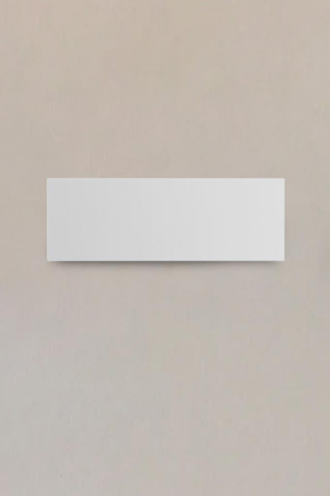 Face view of the rectangular Sorell plaster wall light. 