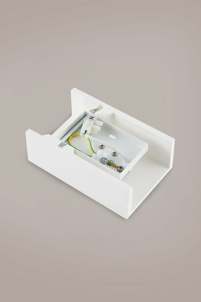 Image of the back of the Taren wall light showing the mounting plate. 