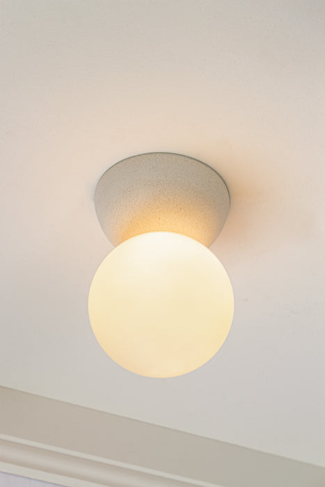 Brooklyn Concrete Orb Ceiling Light opal glass to difuse light