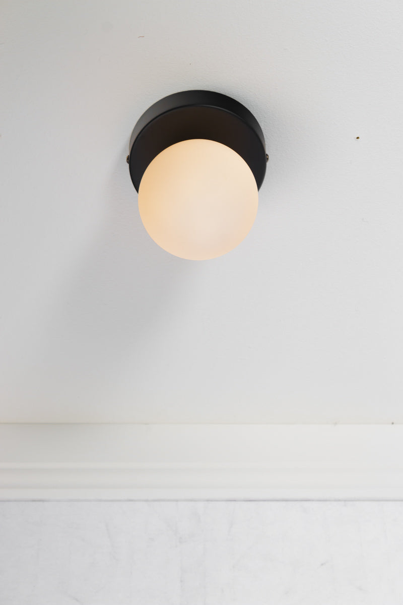 Brooklyn Steel Orb Flush Mount on ceiling