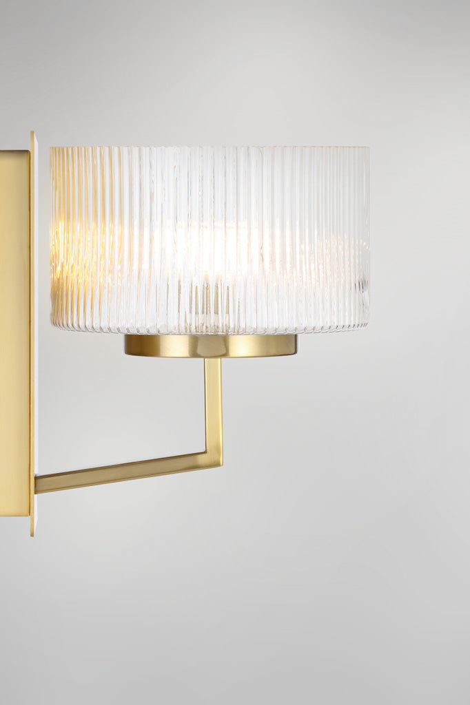 Side view of the Aalto Reeded Glass Wall Light in Antique Gold.