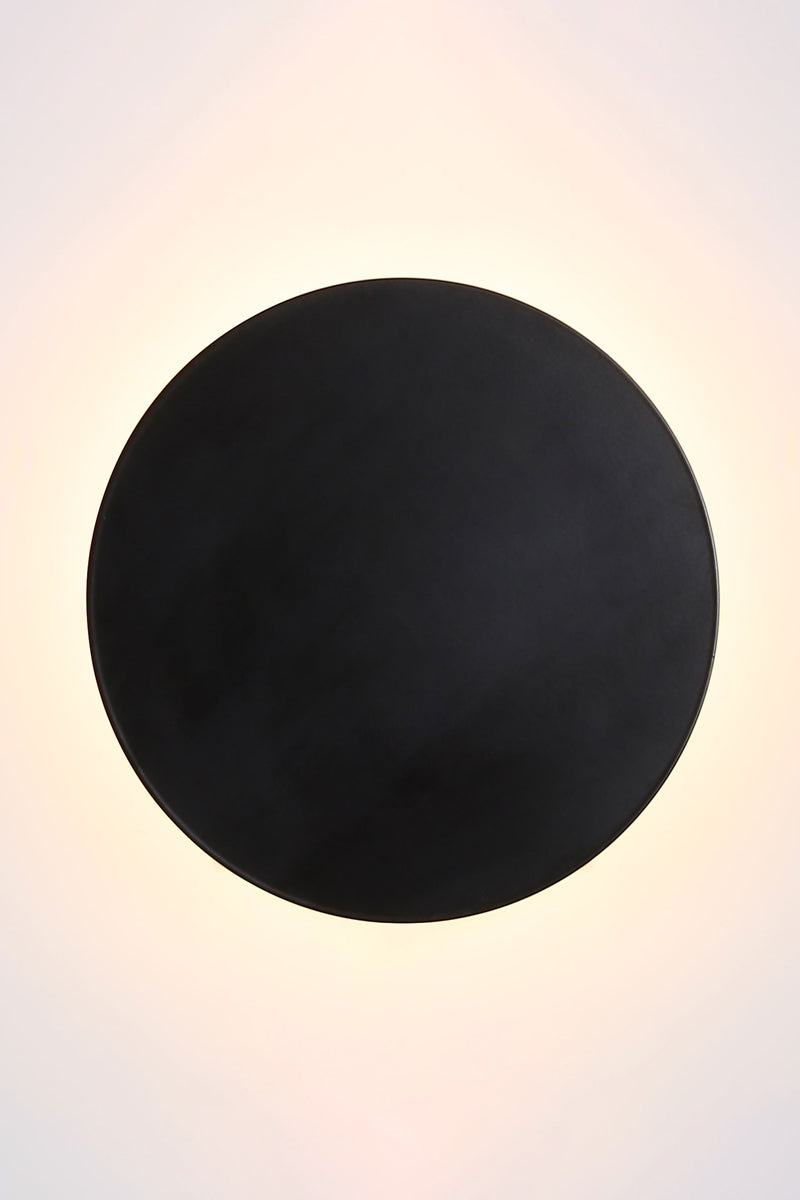 Large black circular back-lit LED wall light. 