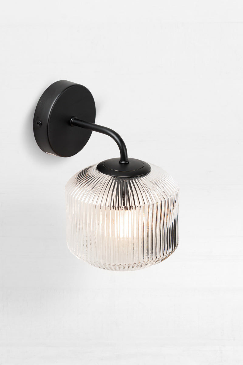 Steller Reeded Glass Wall Light clear with black sconce