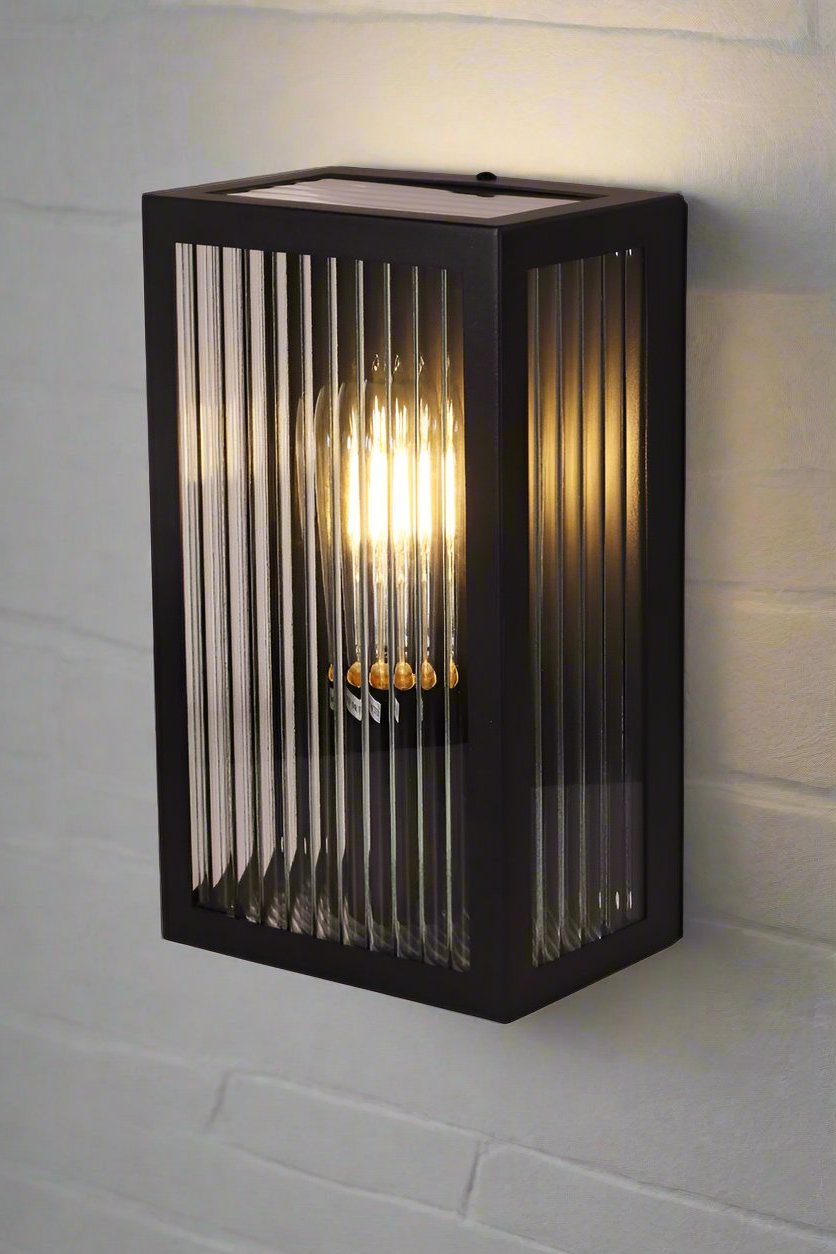 Reeded glass rectangular wall light in black. 