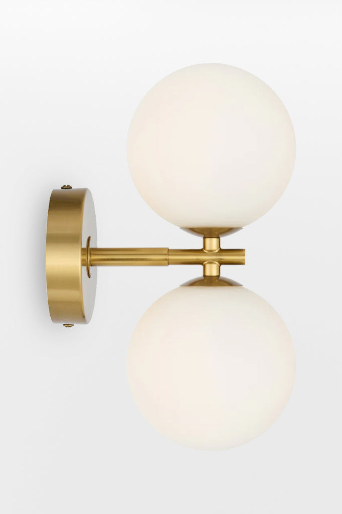 Gold double up/down lampholder wall light with Opal finish. 