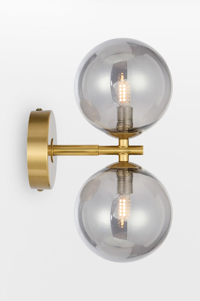 Gold double up/down lampholder wall light with smoke finish. 