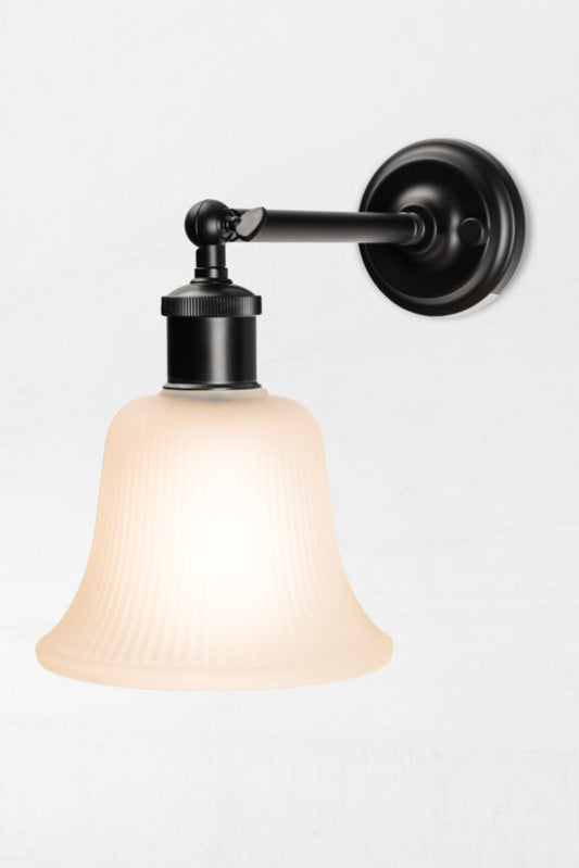 Classic bell shaped shade to complement modern and traditional spaces