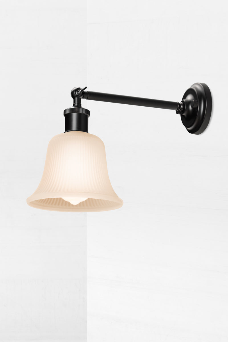 Classic bell shaped shade on long arm to complement modern and traditional spaces