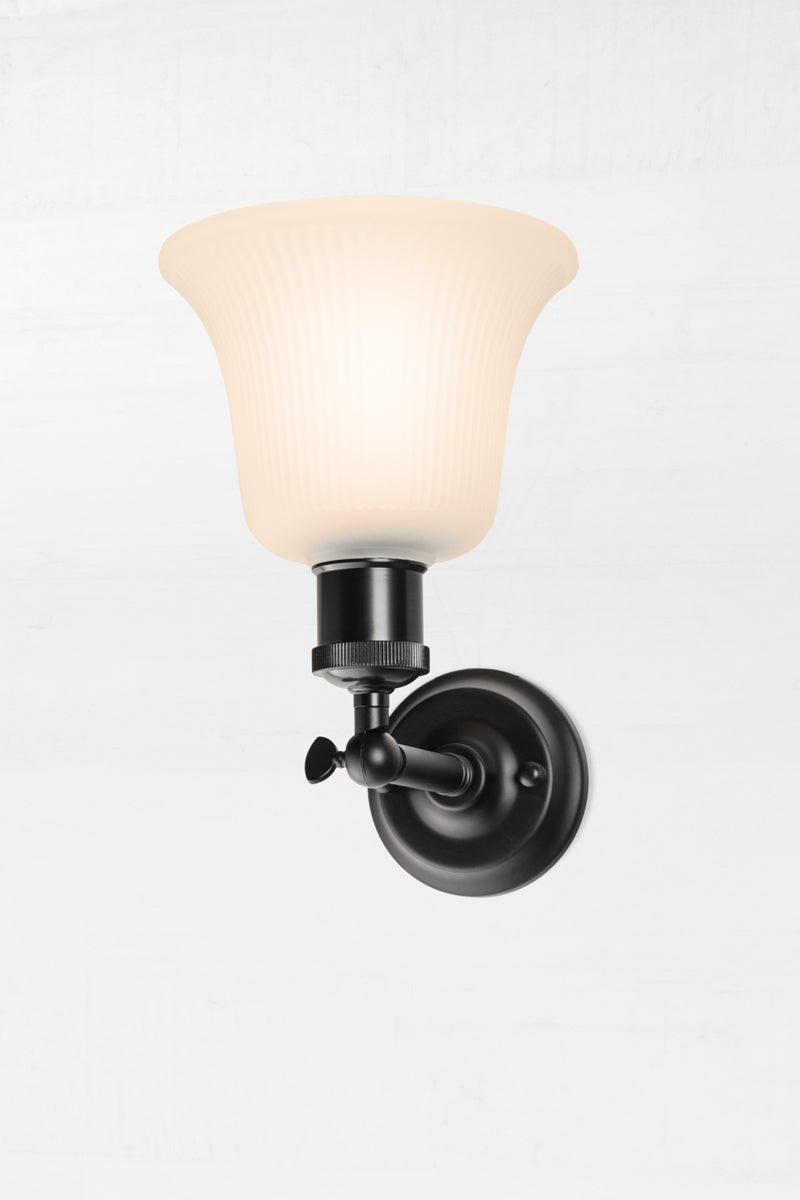 black wall sconce with frost shade 