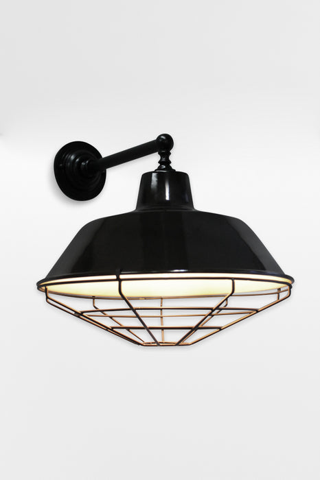 Black wall light with metal shade cage cover