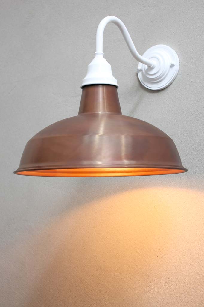 Warehouse Gooseneck Exterior Light with an white gooseneck arm and copper shade. 