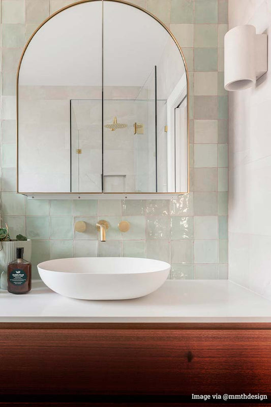 Spotlight in white sandstone inside of a bathroom