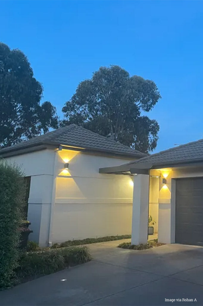 Two Stoncebrook ud/down wall lights on a garage and home entrance. 