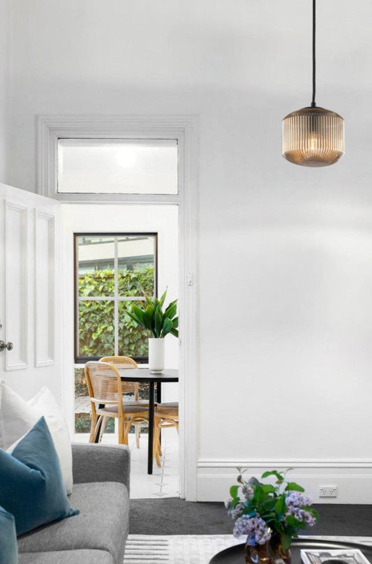 Steller Reeded Glass Pendant in living room