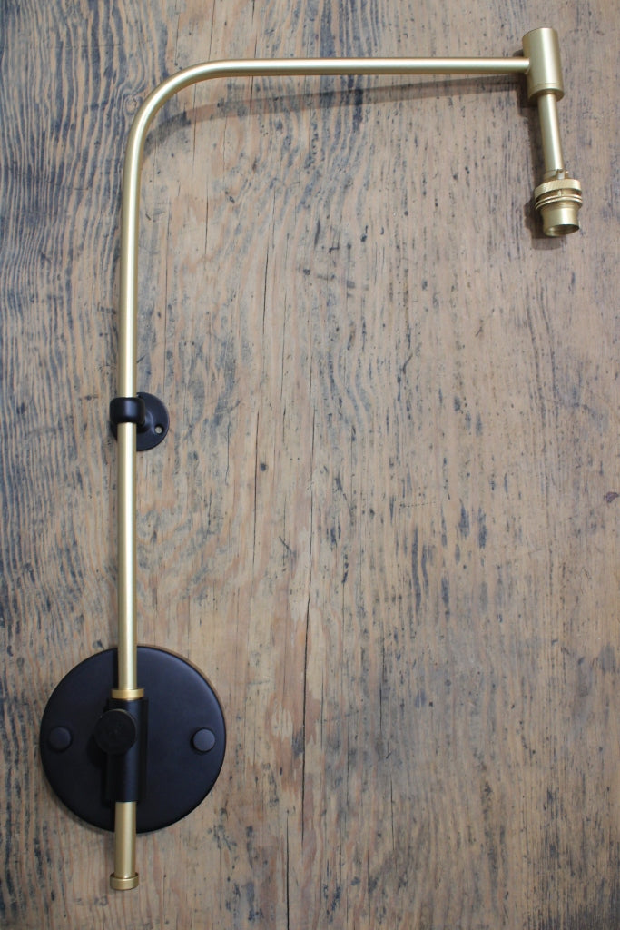 Wing Arm Light Fixture in brass