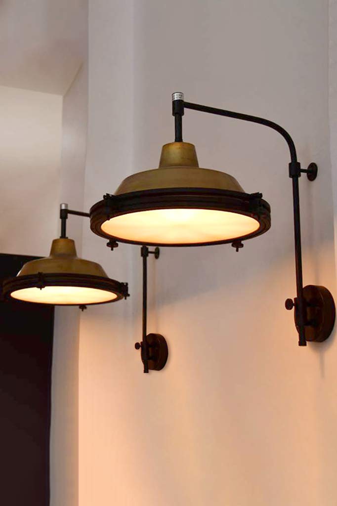 brass and black wall lights