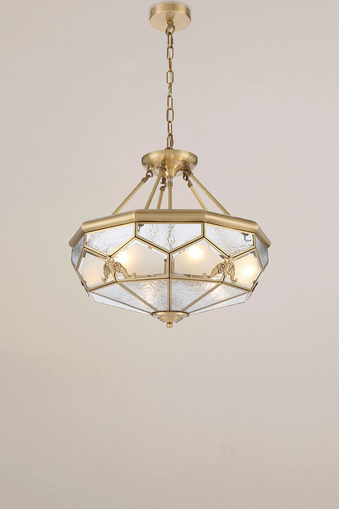 Brass pendant light with clear water glass and acid frost glass panels.